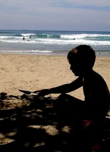 Little Boy Playing in the Shade